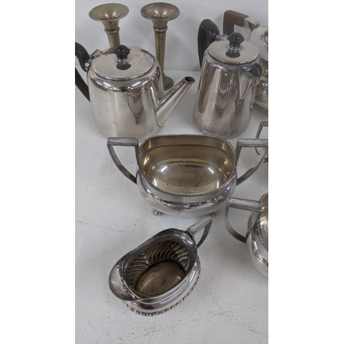 373 - Mixed metalware to include silver plated items, two teapots, sugar bowls, cream jug and others along... 