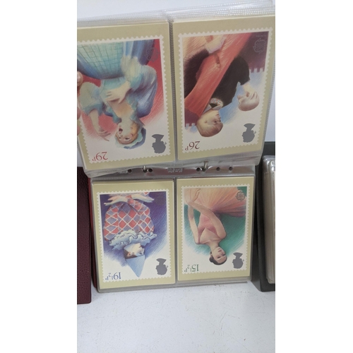 374 - A large quantity of first day covers from around the world along with two albums of Post Office post... 