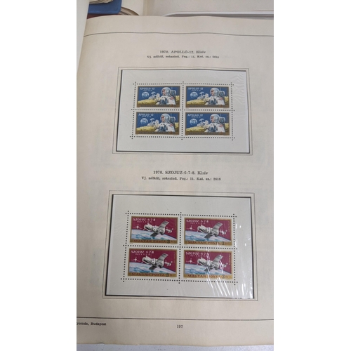 375 - Seven stamp albums filled with sorting stamps to include Olympic stamps, space related examples, mot... 