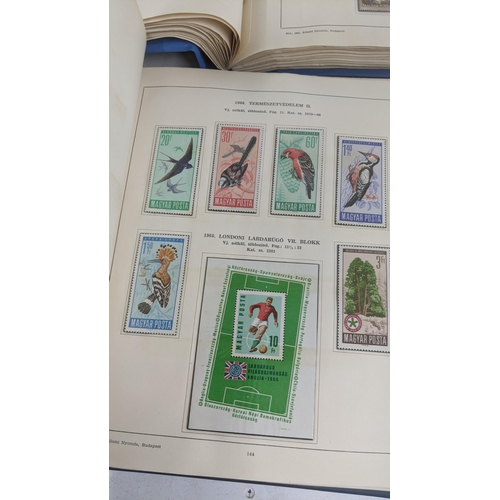 375 - Seven stamp albums filled with sorting stamps to include Olympic stamps, space related examples, mot... 