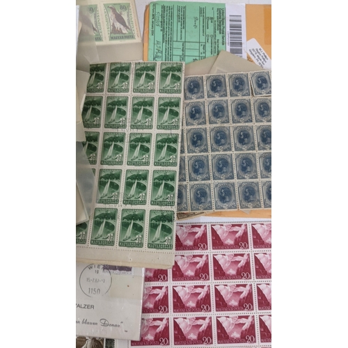 377 - A mixed lot to include a variety of blocks stamps and loose to include British examples of Penny Red... 