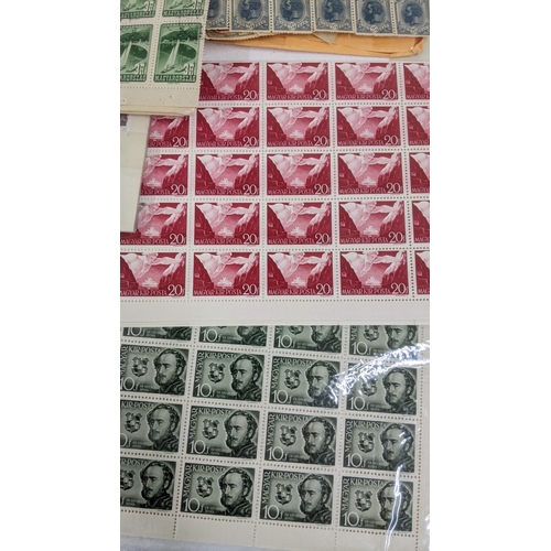 377 - A mixed lot to include a variety of blocks stamps and loose to include British examples of Penny Red... 