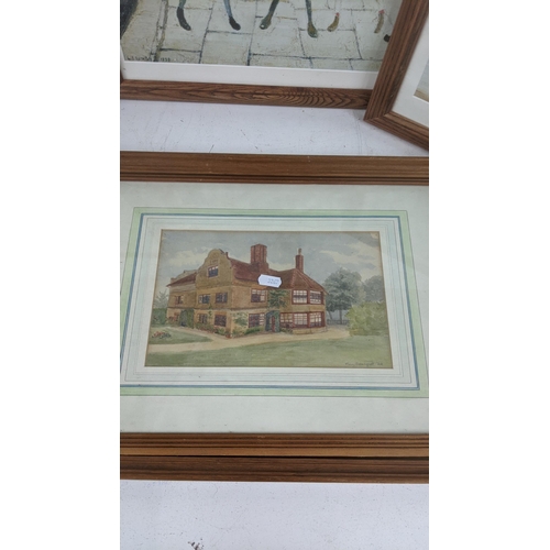 381 - Framed and glazed watercolours and prints to include two LS Lowry prints and others , along with thr... 