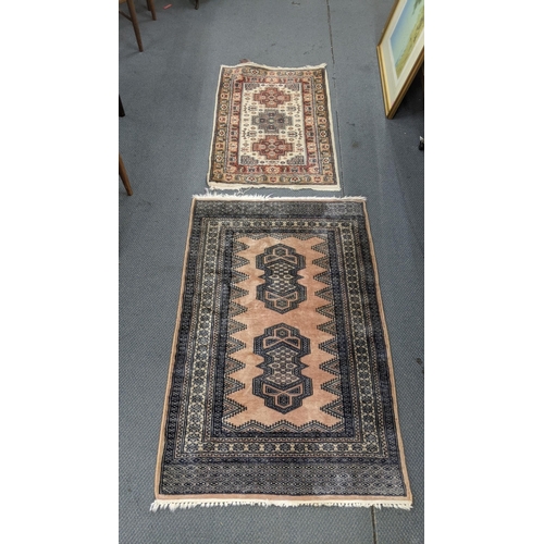 388 - Two small rugs to include Pakistan Turkhaman rug 124cm x 78cm, and another 95cm x 62cm Location:BWR/... 