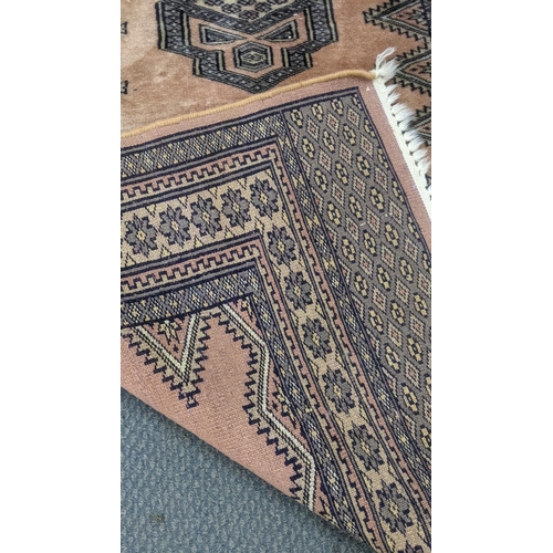 388 - Two small rugs to include Pakistan Turkhaman rug 124cm x 78cm, and another 95cm x 62cm Location:BWR/... 