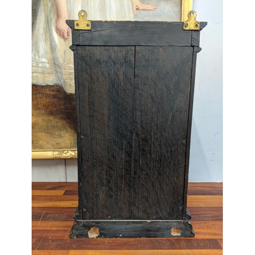 39 - An early 20th century carved wooden cabinet with a wire mesh door and sides Location: G
If there is ... 