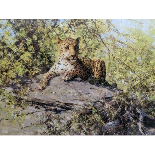 402 - Two David Shepherd prints, one depicting a resting leopard called The Sentinel, signed with a backst... 