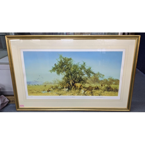 402 - Two David Shepherd prints, one depicting a resting leopard called The Sentinel, signed with a backst... 