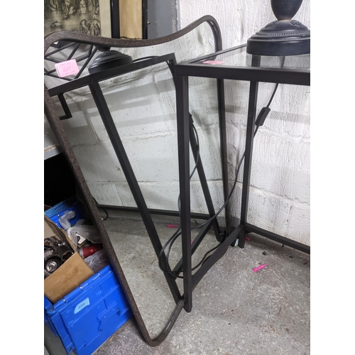 469 - A contemporary black metal framed and glass topped console table, 74cm x 100cm x 43cm, with a simila... 