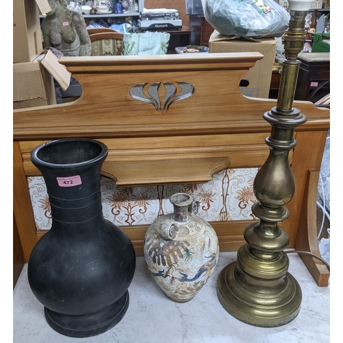 472 - A filled patinated metal vase, a pottery twin handled vase, and a lacquered brass table lamp Locatio... 