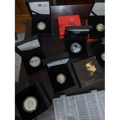 480 - A collection of commemorative silver proof coins and others to include a 2016 UK silver proof commem... 