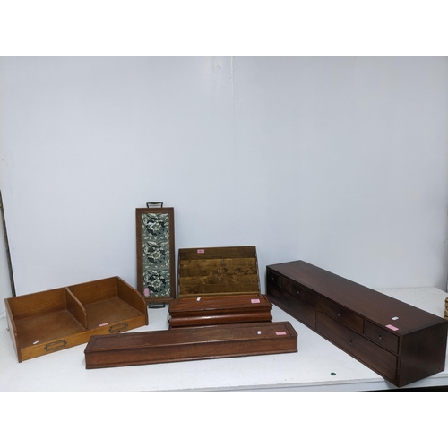 481 - A group of desktop and other wooden items to include a mahogany bank of six drawers with inset brass... 