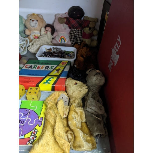 484 - A mixed lot of children's board games and others, soft toys, Wedgwood Peter Rabbit child's table chi... 