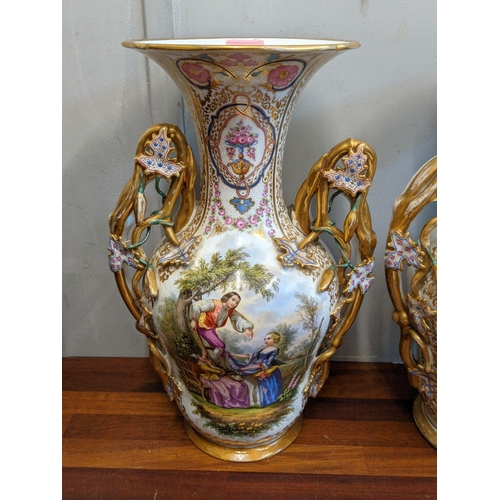 49 - A pair of late 19th century French porcelain painted and gilt vases decorated with panels of figures... 