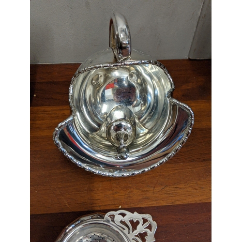 52 - Silver plate to include a tea pot, a tea strainer, Kings pattern tea spoons, sugar bowls and other i... 