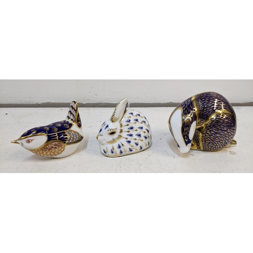 54 - Three Royal Crown Derby paperweights in the shape of a wren, rabbit and badger along with a Minton t... 