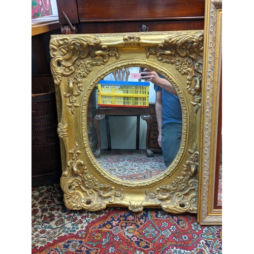 57 - A modern gold painted ornate mirror and a gilt framed mirror with a tapestry panel
Location: A1F
If ... 