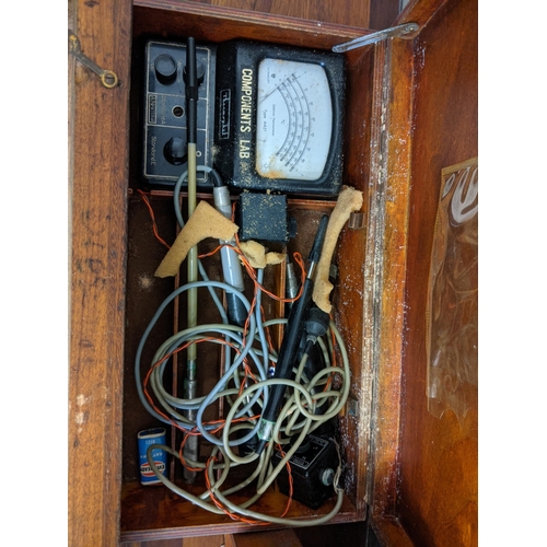 61 - Mixed early/mid 20th century electrical equipment to include an Eversheds portable testing kit, a Em... 