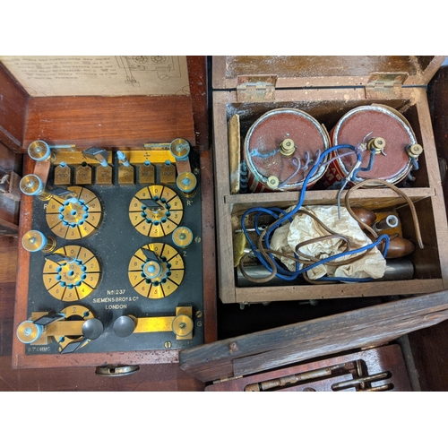 61 - Mixed early/mid 20th century electrical equipment to include an Eversheds portable testing kit, a Em... 