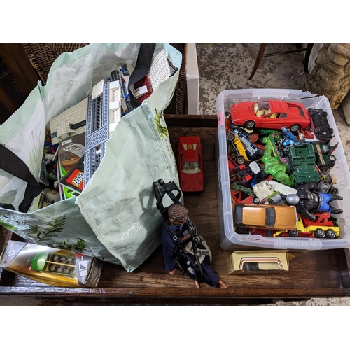 80 - A mixed lot of toys to include various diecast vehicles, bag of Lego, a Mattel inc figurine, c1998 a... 