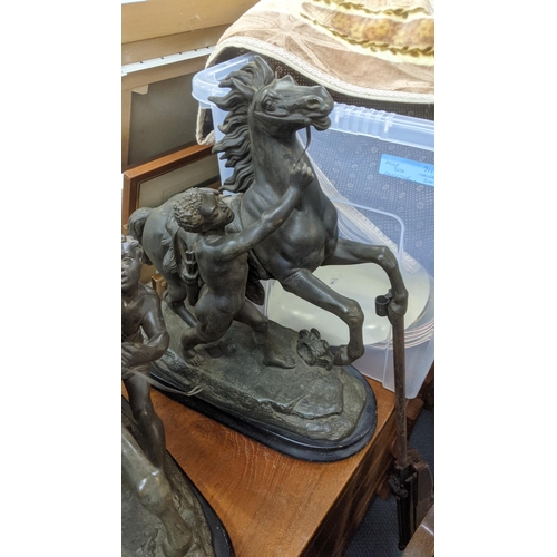 15 - A pair of late 19th century large spelter Marley Horses each on a black painted wooden base
Location... 