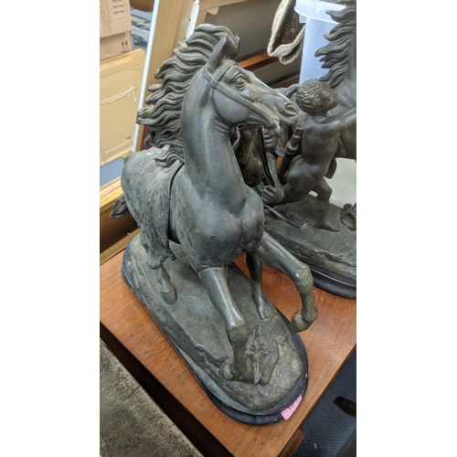 15 - A pair of late 19th century large spelter Marley Horses each on a black painted wooden base
Location... 