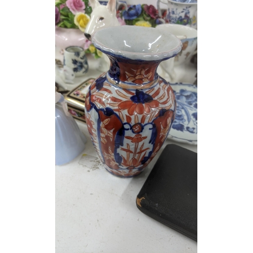 432 - A mixed lot to include a Meiji Imari Japanese vase, a Lladro figure '5221 Sweet Scent', three Coalpo... 