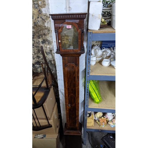 467 - A 20th century mahogany and hardwood longcase with a brass dial and narrow trunk, 192cm high
Locatio... 