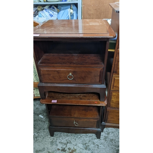 95 - A Stagg mahogany chest of drawers, two long above three short and two further long drawers, on brack... 