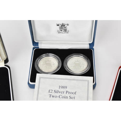 49 - United Kingdom - Elizabeth II (1952-2022), A collection of 6 boxed Silver Proof Two Pounds, comprisi... 