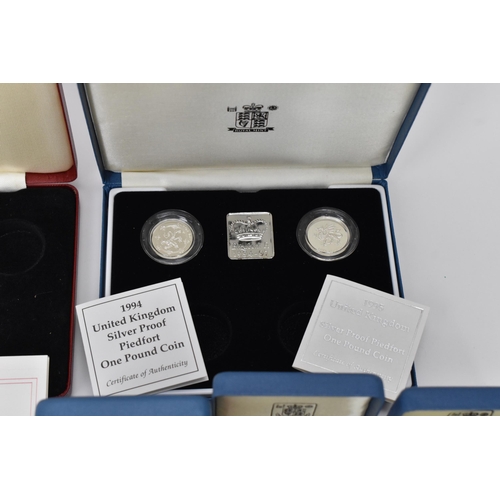 51 - United Kingdom-Elizabeth II (1952-2022), A collection of 16 boxed Silver Proof One Pound Coins, comp... 