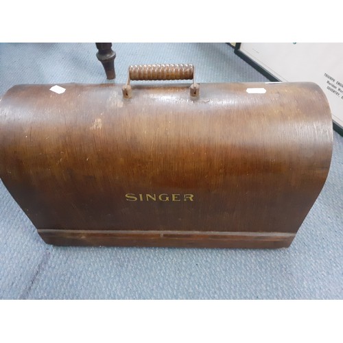 337 - A 1929 99k Singer electric sewing machine A/F, serial number Y695604 having a domed case and oak bas... 