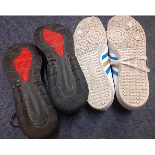 102 - Two pairs of gents shoes, UK size 12 comprising Nike Air 70 in black with red heel and accents and a... 