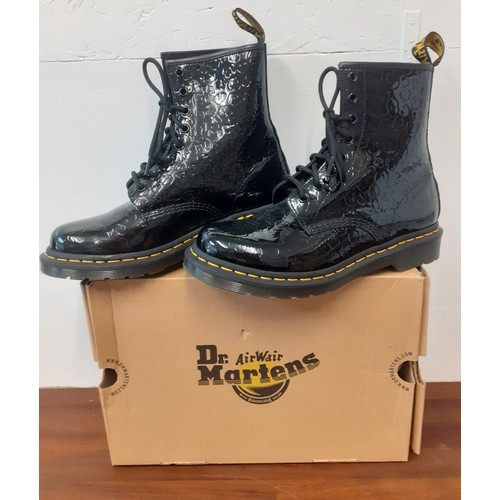 103 - Doc Martins- A pair of 'Air Wair' black patent DM 1460W Leopart Pat Heath ankle boots with rubber so... 