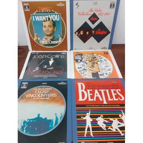 215 - Approximately 50 x 1980's videodiscs to include Stripes with Bill Murray, The Stranglers Collection ... 