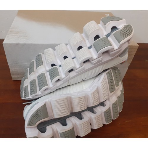 104 - Cloudswift- A pair of white and grey lace-up trainers, size UK5½. Location:RWB