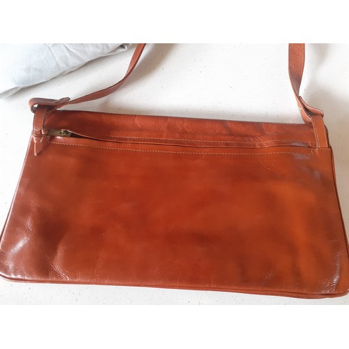 175 - Charles Jourdan-A vintage brown leather shoulder bag 34cm wide x 19cm high with gold tone clasp and ... 