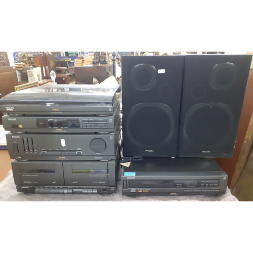 216 - A Philips stereo system to include a turntable FP9410 together with a Philips CD player AK601 and a ... 