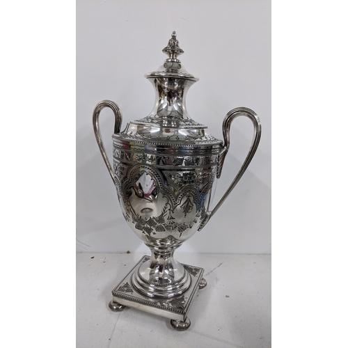 335 - An Edwardian silver plated samovar having a floral swag design and engraved with inscription, 40.5cm... 