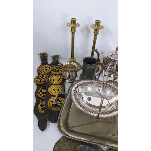 338 - A mixed lot of metalware to include a silver plated tray, Arts & Crafts pewter candlesticks and othe... 