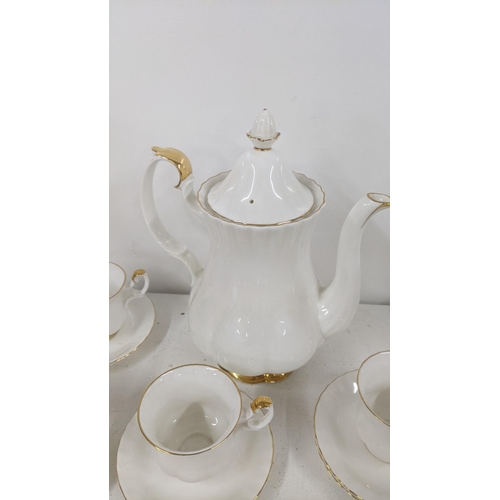 433 - Royal Albert Duchess pattern tea and coffee set decorated with a band of gilt Location: LWB
If there... 