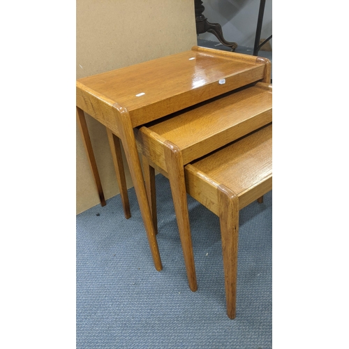 441 - Mid century oak nest of tables
Location:A1M
If there is no condition report shown, please request