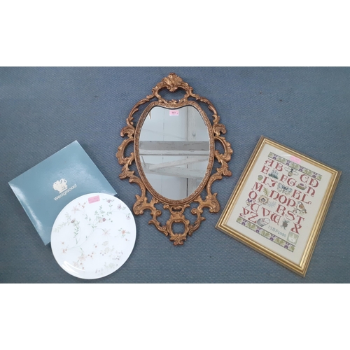 503 - A mid 20th century Rococo style gilt wall mirror, a modern sampler and a Wedgwood cake plate.
Locati... 