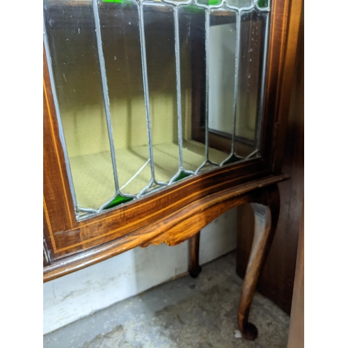 514 - A late Victorian inlaid mahogany bow fronted display cabinet, 3/4 galleried top with inlaid floral d... 