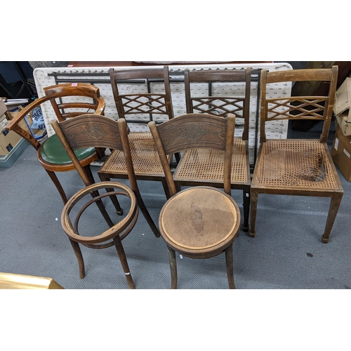 530 - Mixed chairs to include a 1930's Bentwood armchair, cane seated dining chairs
Location: A1B
If there... 