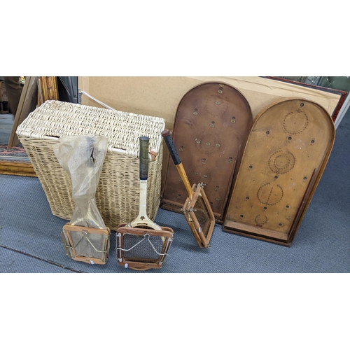 532 - Two early 20th century bagatelle boards together with three rackets and a wicker basket
Location: A3... 