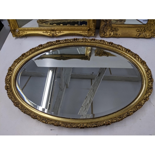 538 - Three gilt framed mirrors to include an oval shaped example 84cm x 58cm, a rectangular example 63.5c... 