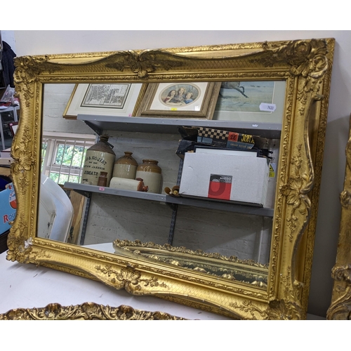 538 - Three gilt framed mirrors to include an oval shaped example 84cm x 58cm, a rectangular example 63.5c... 