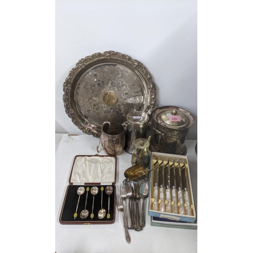 549 - Mixed silver plated items to include floral embossed biscuit barrel, a coffee pot and others
Locatio... 