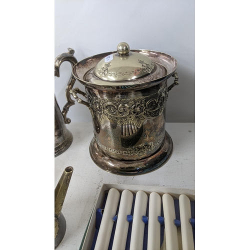 549 - Mixed silver plated items to include floral embossed biscuit barrel, a coffee pot and others
Locatio... 